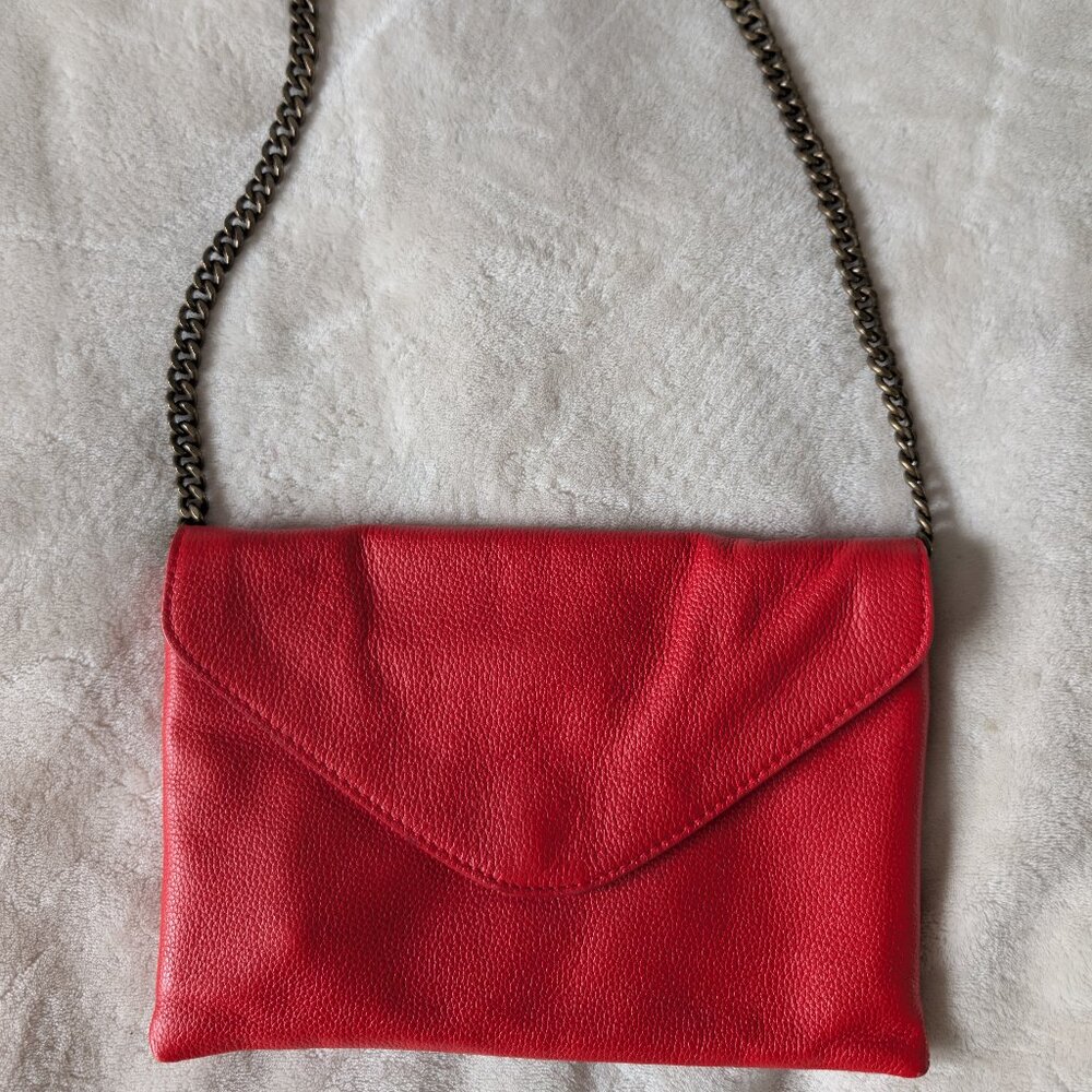 3/$30 Bold coral train strap envelope purse